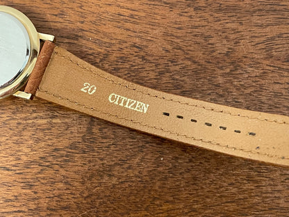 (1988) Citizen 6355-Y55299 triple calendar - cream dial w/ gold Arabic numerals (mint)