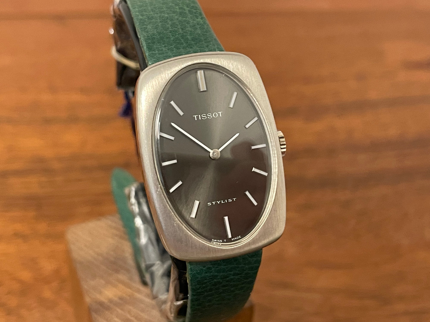(1970s) Tissot Stylist dress watch - oval grey sunburst dial w/ white stick markers - small size (NOS)