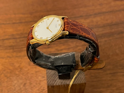 (1981) Citizen 6031-S38419 dress watch - white dial w/ gold Roman numerals - small size (NOS)