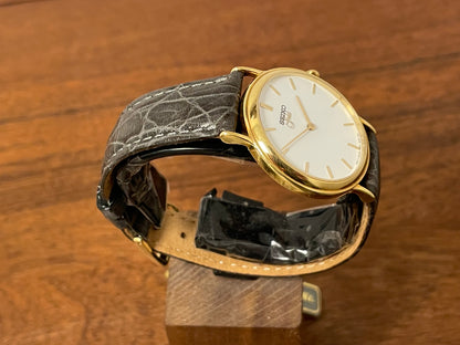(1994) Seiko 7N00-S007 "Gold" 18K gold collection dress watch - 18k solid gold case - white dial w/ gold markers