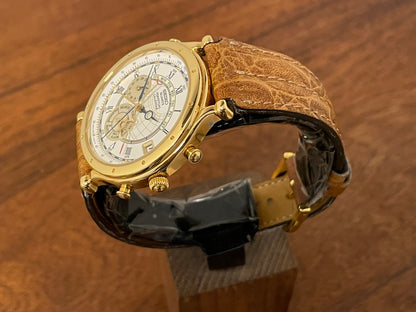 (1994) Seiko 6m13-0010 Age of Discovery (AOD) Perpetual Calendar - gold colored case - white dial w/ black Roman numerals