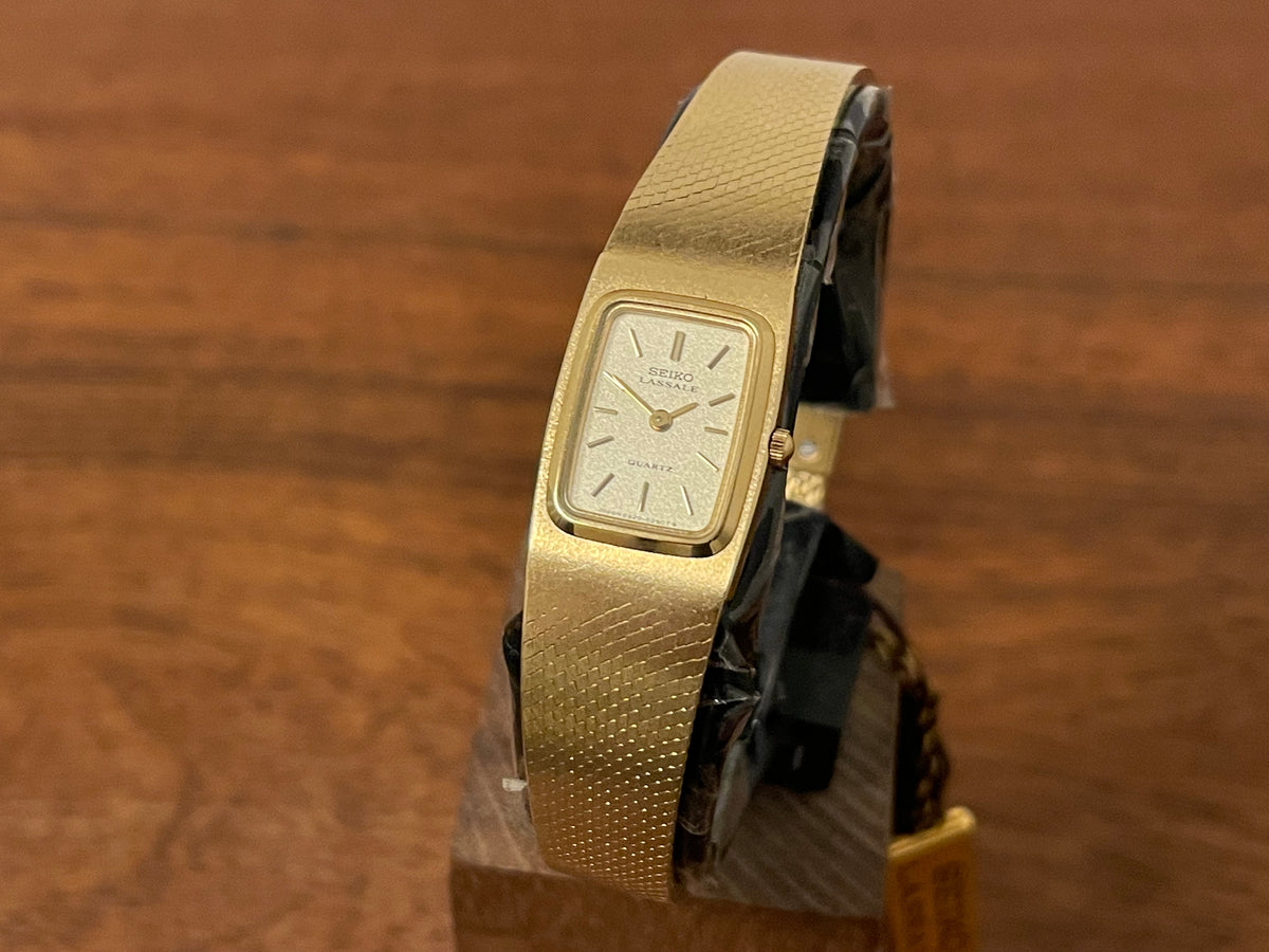 Front side (1981) Seiko 8420-5219 Lassale dress watch - gold integrated bracelet & case - gold dust dial w/ gold stick markers - small size (NOS)