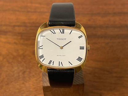 (1970s) Tissot Stylist dress watch - gold “tv case” - white dial w/ black Roman numerals (NOS)
