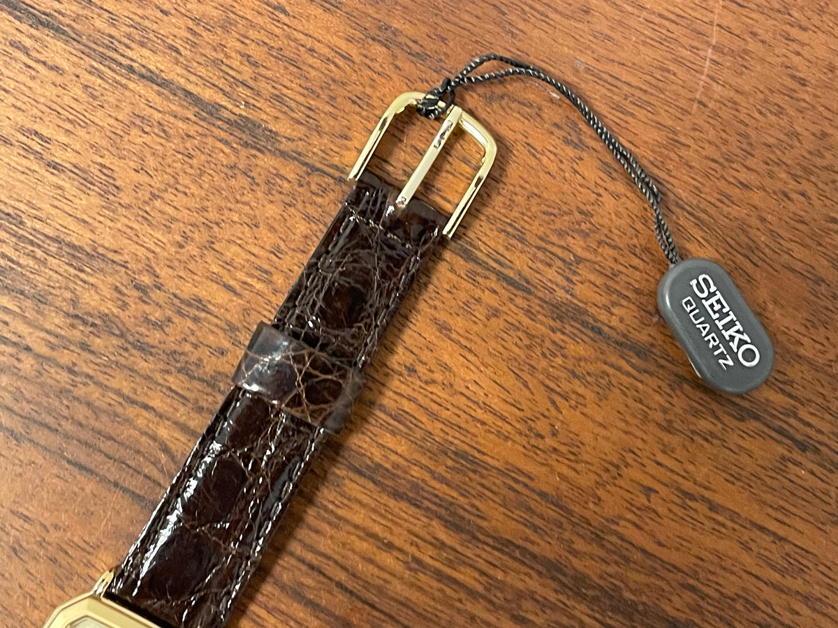 (1987) Seiko 5E20-5A00 "Tank" dress watch - champagne patterned dial w/ gold markers (NOS)