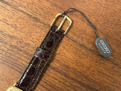 (1987) Seiko 5E20-5A00 "Tank" dress watch - champagne patterned dial w/ gold markers (NOS)