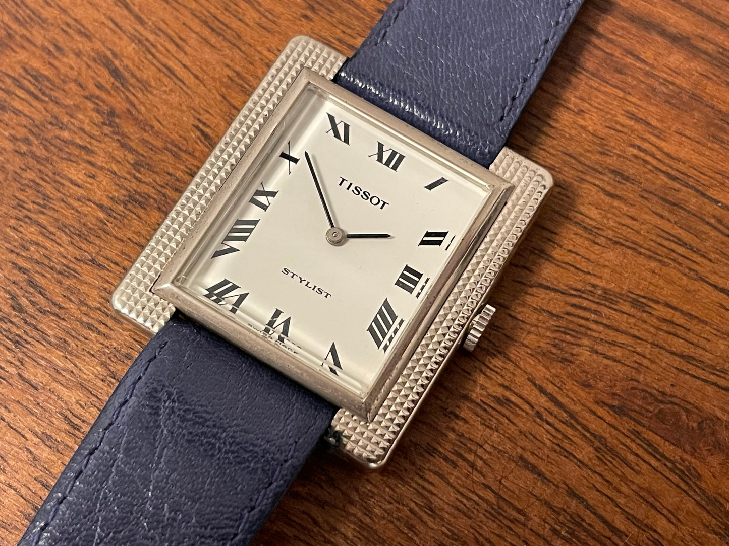 (1970s) Tissot Stylist "Tank" - decorated case - white dial w/ black Roman numerals (NOS)
