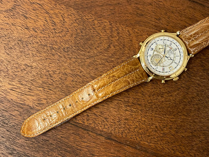 (1994) Seiko 6m13-0010 Age of Discovery (AOD) Perpetual Calendar - gold colored case - white dial w/ black Roman numerals