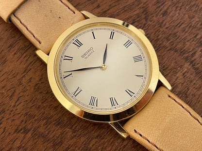 (1989) Seiko 5Y94-8000 dress watch - gold case - cream dial w/ black Roman numerals (NOS)
