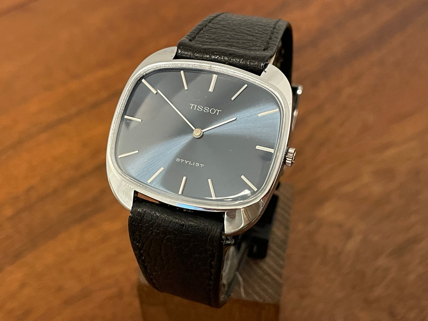 Front side (1970s) Tissot Stylist dress watch - silver “tv case” - sunburst blue dial w/ silver stick markers (NOS)