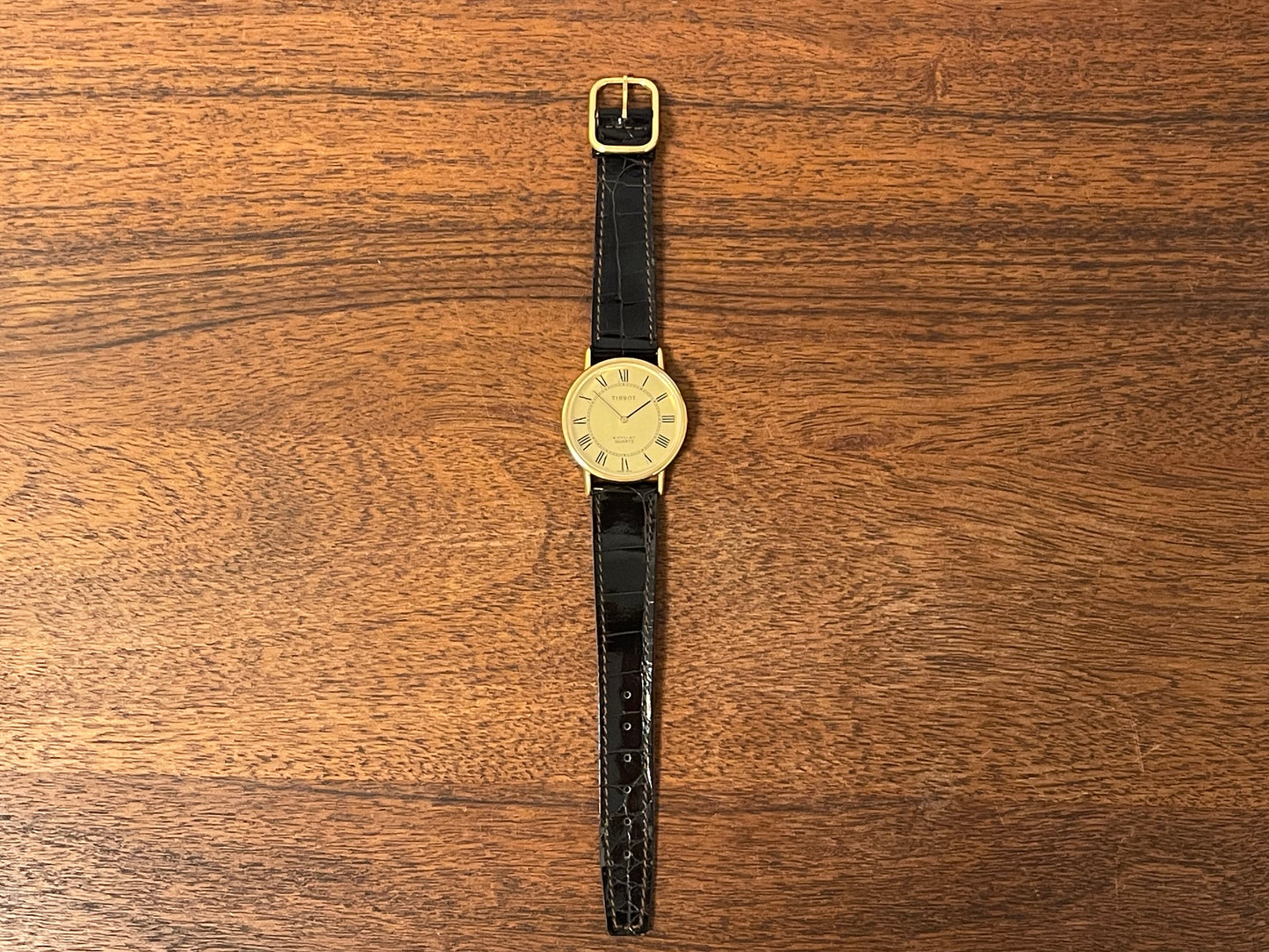 (1970s) Tissot 40771 Stylist dress watch - gold case - brushed gold dial w/ black Roman numerals (NOS)