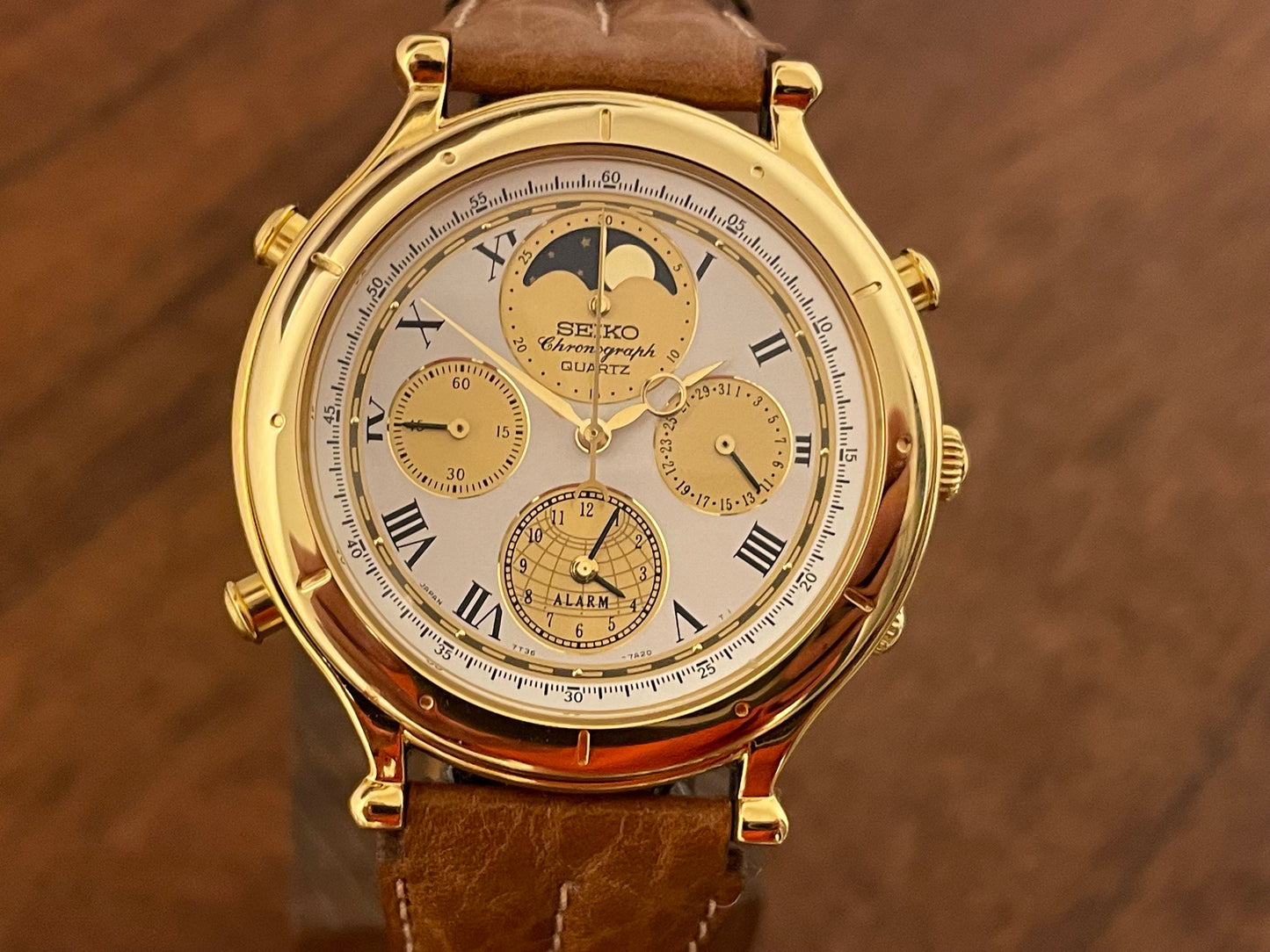 (1990) Seiko 7T36-7A10 Age of Discovery (AOD) chronograph - gold colored case - white dial w/ gold subdials & moonphase