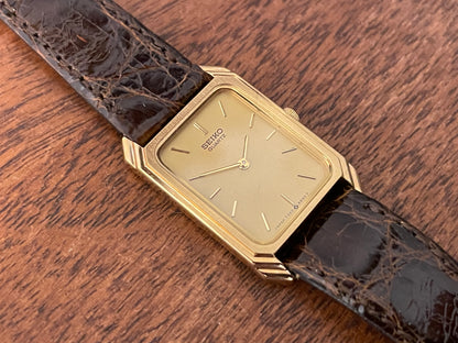 (1983) Seiko 7320-5500 "Tank" dress watch - gold dial w/ gold markers - small size (NOS)