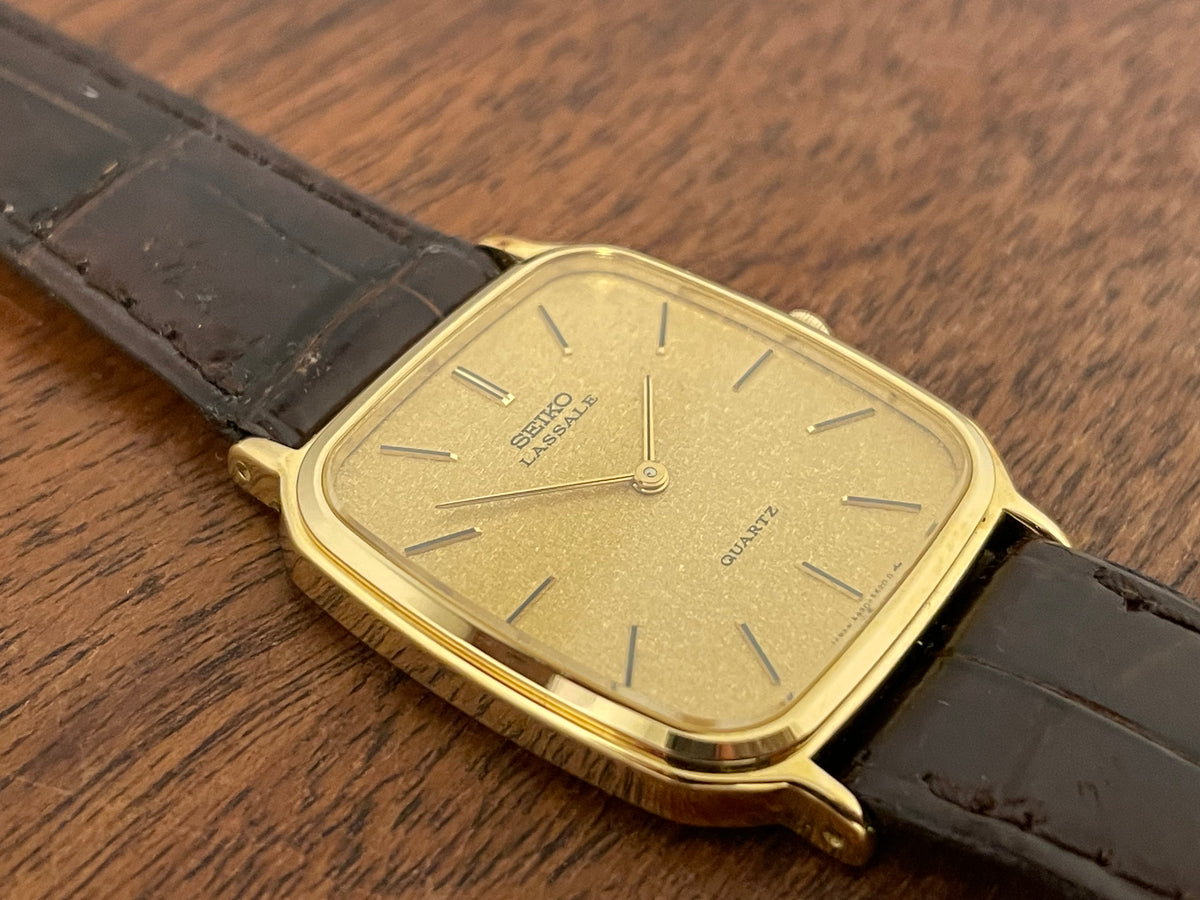 (1981) Seiko 5930-5509 Lassale dress watch - gold textured dial w/ gold stick markers (NOS)