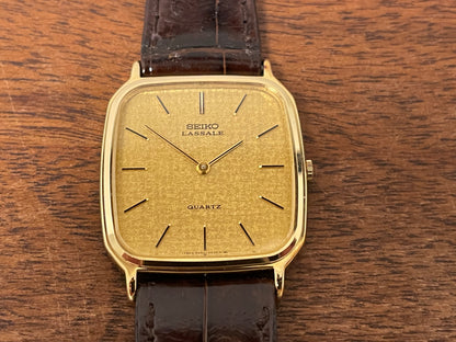 (1981) Seiko 5930-5509 Lassale dress watch - gold textured dial w/ gold stick markers (NOS)