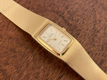 (1981) Seiko 8420-5219 Lassale dress watch - gold integrated bracelet & case - gold dust dial w/ gold stick markers - small size (NOS)