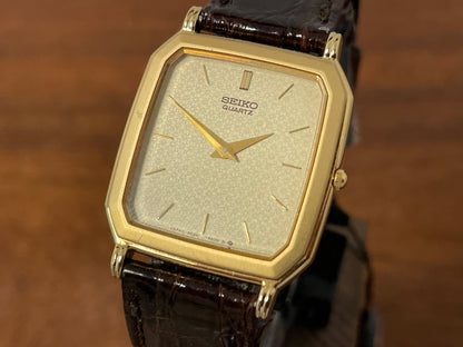(1987) Seiko 5E20-5A00 "Tank" dress watch - champagne patterned dial w/ gold markers (NOS)