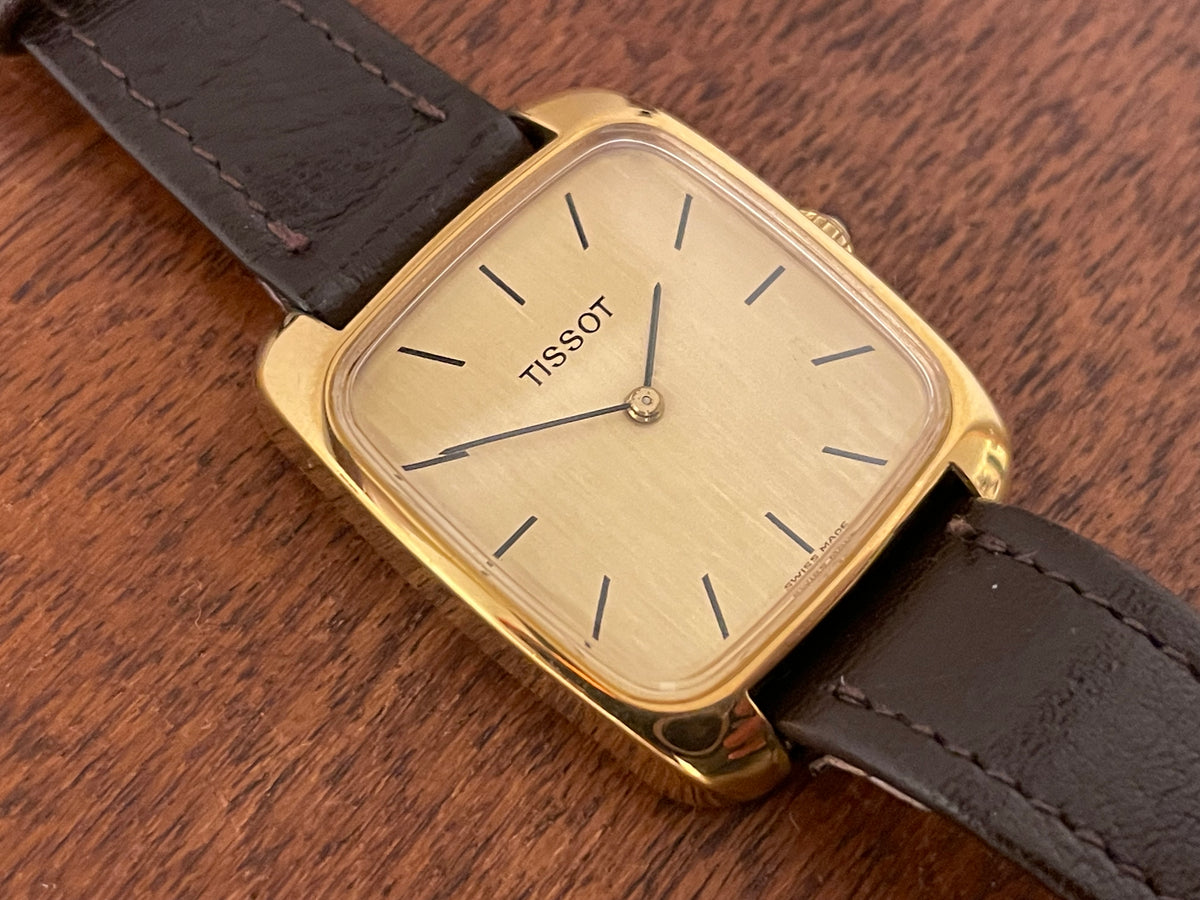 (1970s) Tissot 642-10778 Stylist dress watch - gold square case - gold brushed dial w/ gold stick markers - small size (NOS)