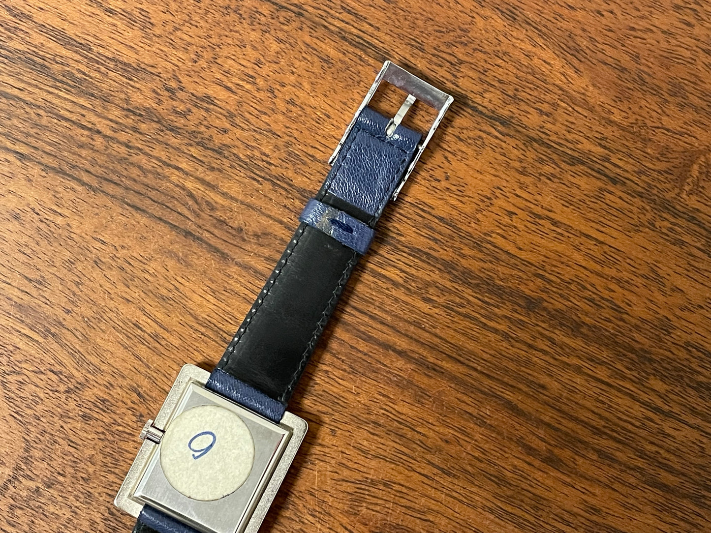 (1970s) Tissot Stylist "Tank" - decorated case - white dial w/ black Roman numerals (NOS)