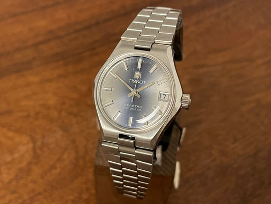 Front side (1970s) Tissot Seastar automatic - blue/silver sunburst dial w/ silver stick markers - small size (NOS)