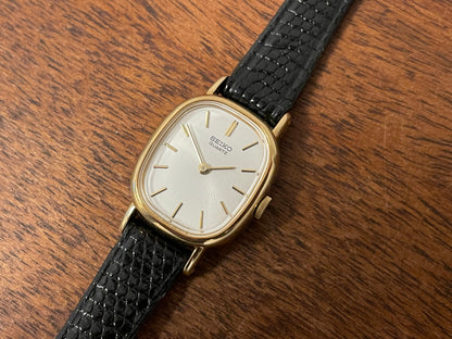(1981) Seiko 5420-5119 "Ellipse" - gold plated case - silver sunburst dial w/ gold markers - small size (NOS)