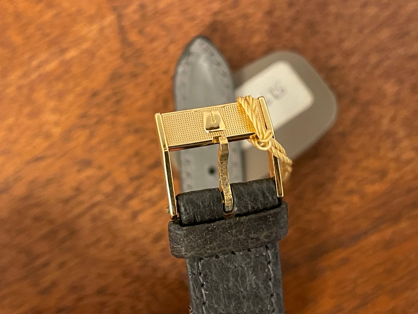 (1980s) Universal Genève 6-566 dress watch - silver case w/ gold beaded bezel - grey sunburst dial (NOS)