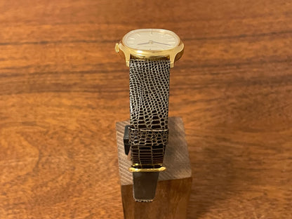 (1970s) Tissot 41141 "Ellipse" dress watch - gold case - silver brushed dial w/ gold stick markers (NOS)