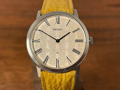 (1976) Seiko 2220-0180 Chariot dress watch - silver textured waffle dial w/ Roman numerals