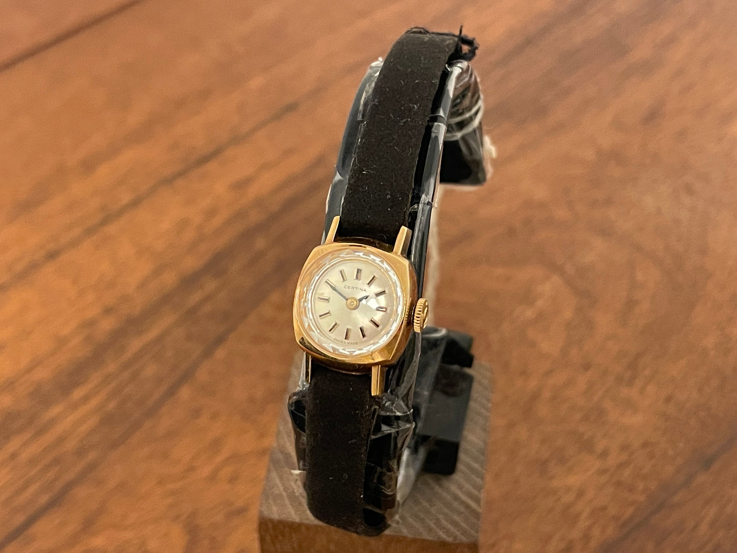 Front side (1970s) Certina 2850 "cocktail" dress watch - silver sunburst dial w/ stick markers - small size (NOS)