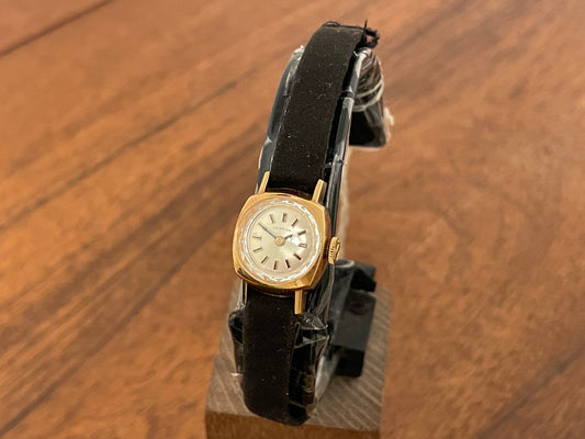 Front side (1970s) Certina 2850 "cocktail" dress watch - silver sunburst dial w/ stick markers - small size (NOS)
