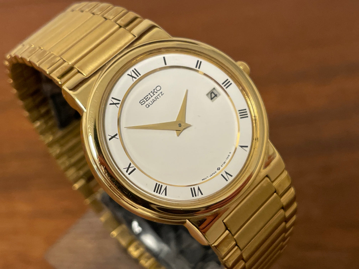 (1992) Seiko 5Y89-7A10 dress watch – white dial w/ Roman numerals & date (NOS)