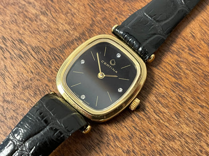 (1970s) Certina 706SP dress watch - gold plated case - black dial w/ diamond markers - small size (NOS)
