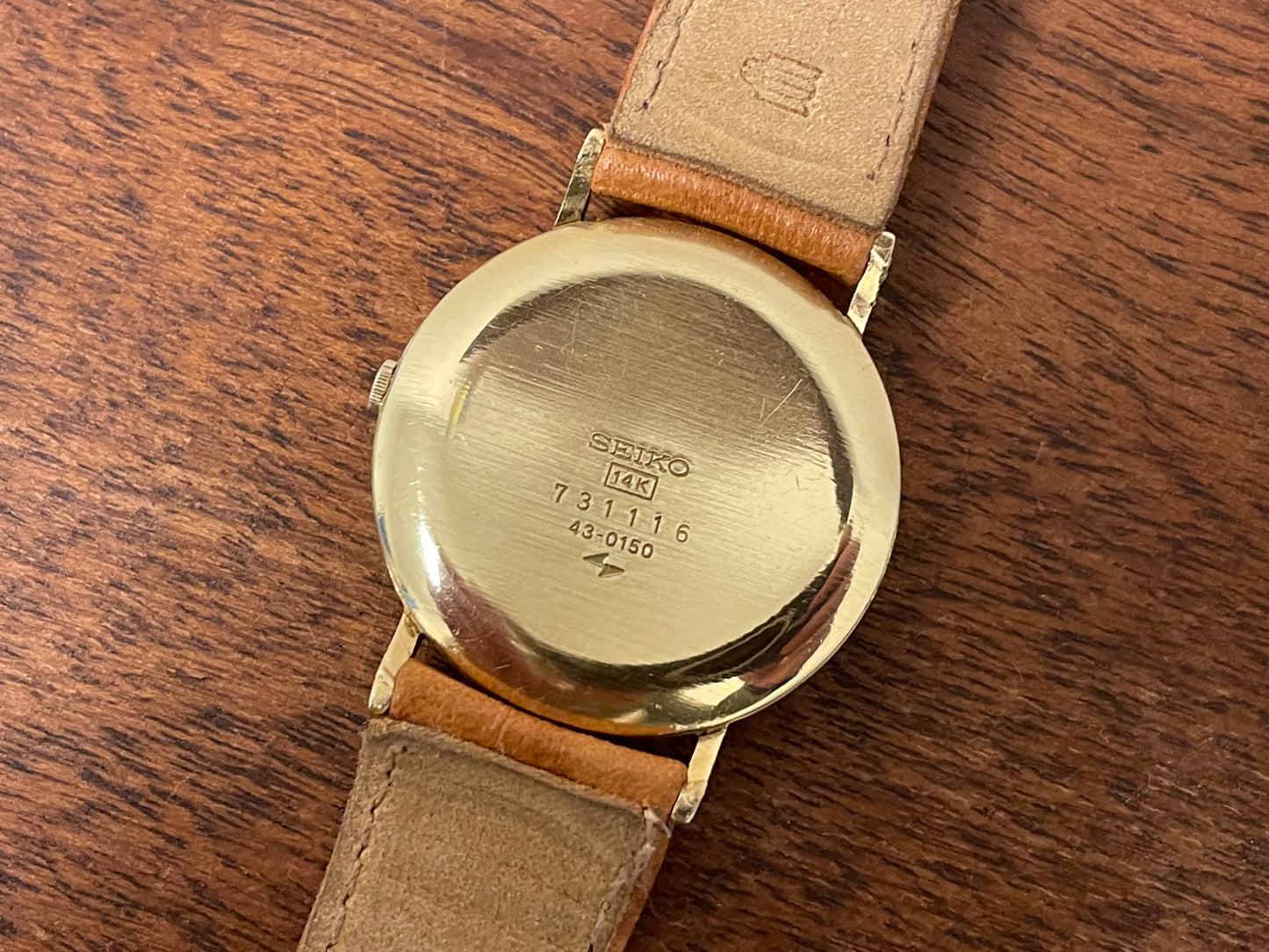 (1977) Seiko 43-0150 14K solid gold dress watch - rope bezel -  gold textured dial w/ gold markers