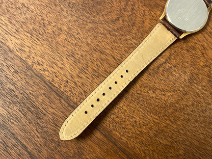 (2003) Seiko 7N01-7041 quartz dress watch - gold case w/ white dial & Arabic numerals (NOS)