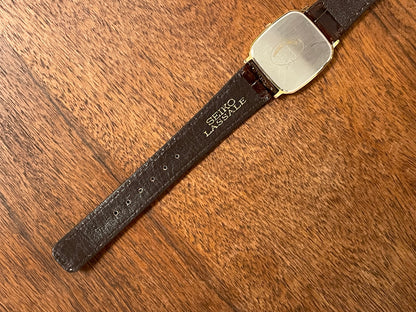 (1981) Seiko 5930-5509 Lassale dress watch - gold textured dial w/ gold stick markers (NOS)