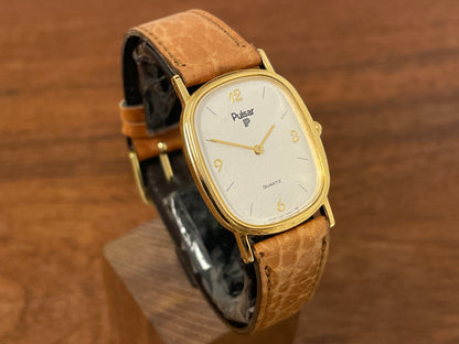 (1985) Pulsar V320-5029 "Ellipse" dress watch - gold case - diamond dust dial (NOS)