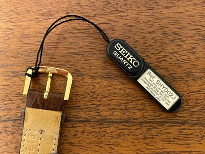 (1992) Seiko 7T39-7A00 Age of Discovery (AOD) chronograph -  gold case w/ white speckled dial (NOS)