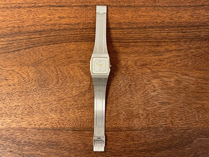 (1985) 5Y02-5010 Seiko 5 quartz - integrated bracelet - silver brushed dial w/ stick markers (mint)