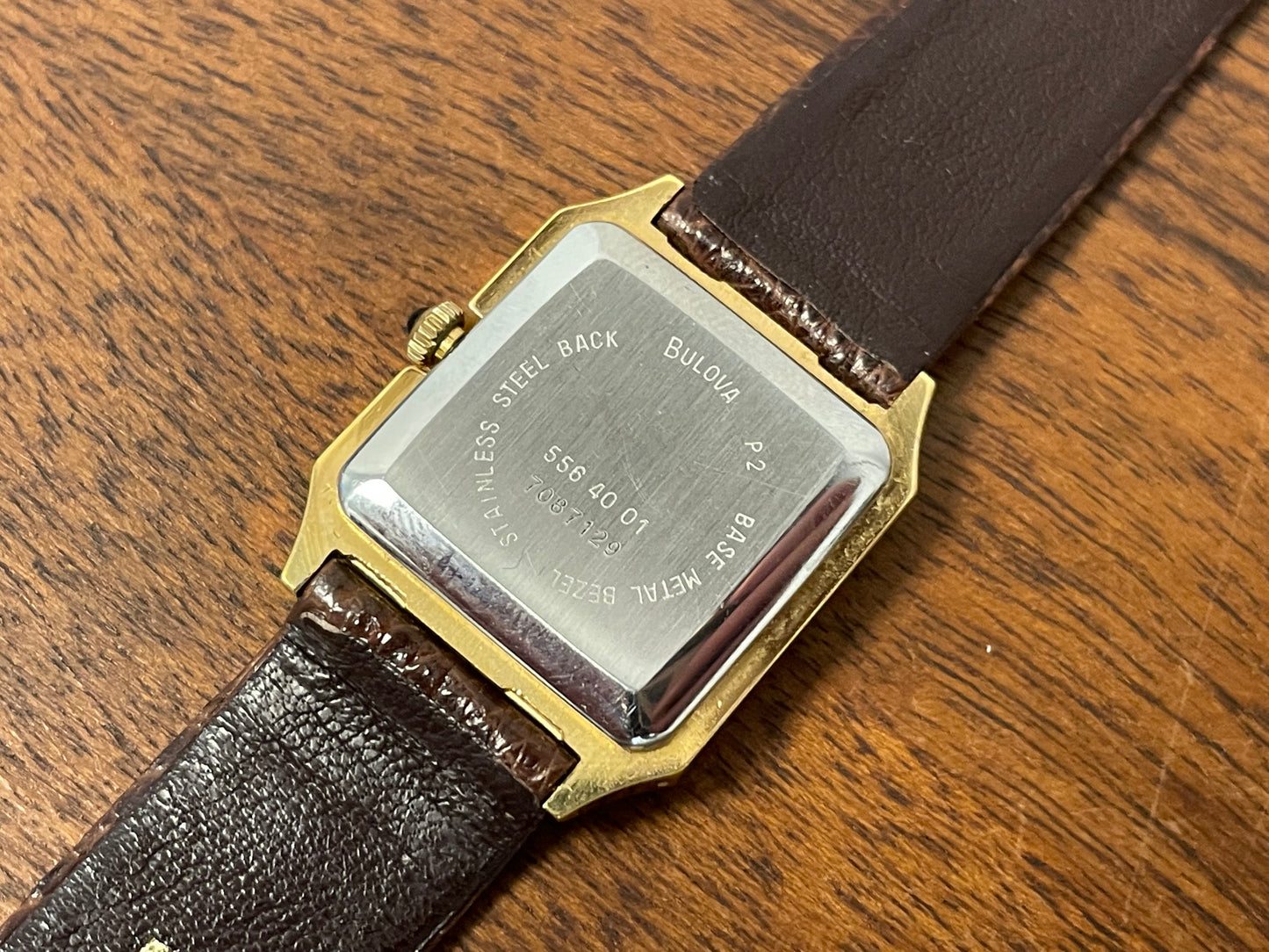 (1982) Bulova Longchamp "Tank" dress watch - gold case w/ champagne dial - small size (NOS)