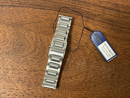 (1995) Seiko 1N00-OJH0 - "Tank" style case - blue dial w/ silver Roman numerals & markers - small size (NOS)