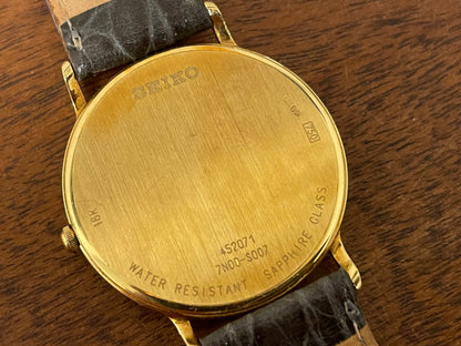 (1994) Seiko 7N00-S007 "Gold" 18K gold collection dress watch - 18k solid gold case - white dial w/ gold markers