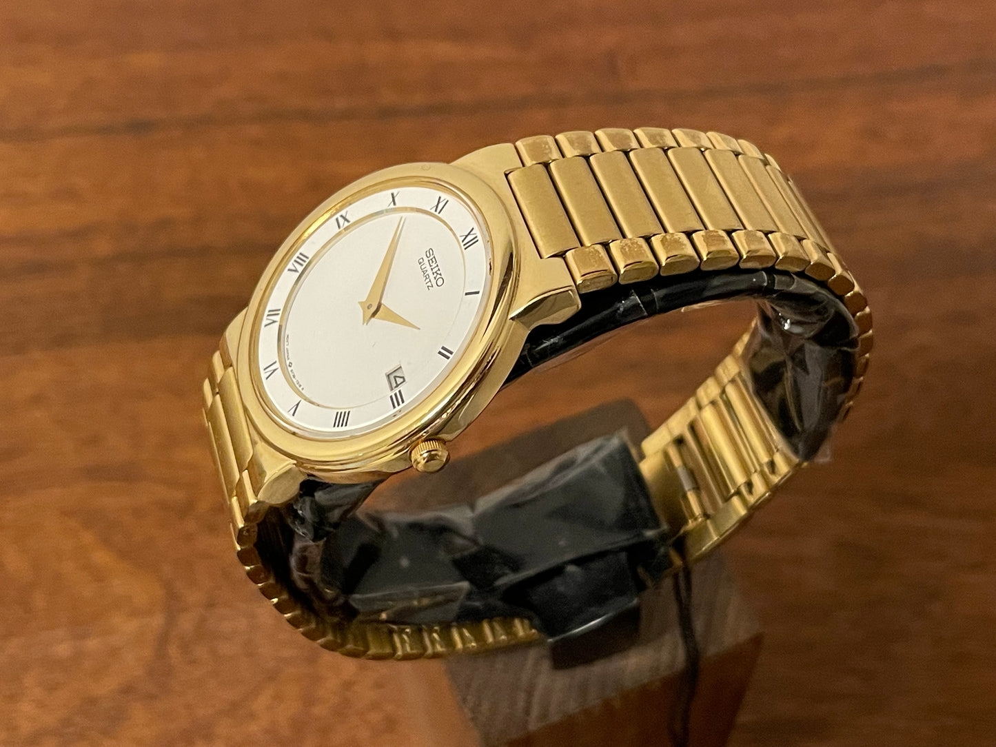 (1992) Seiko 5Y89-7A10 dress watch – white dial w/ Roman numerals & date (NOS)