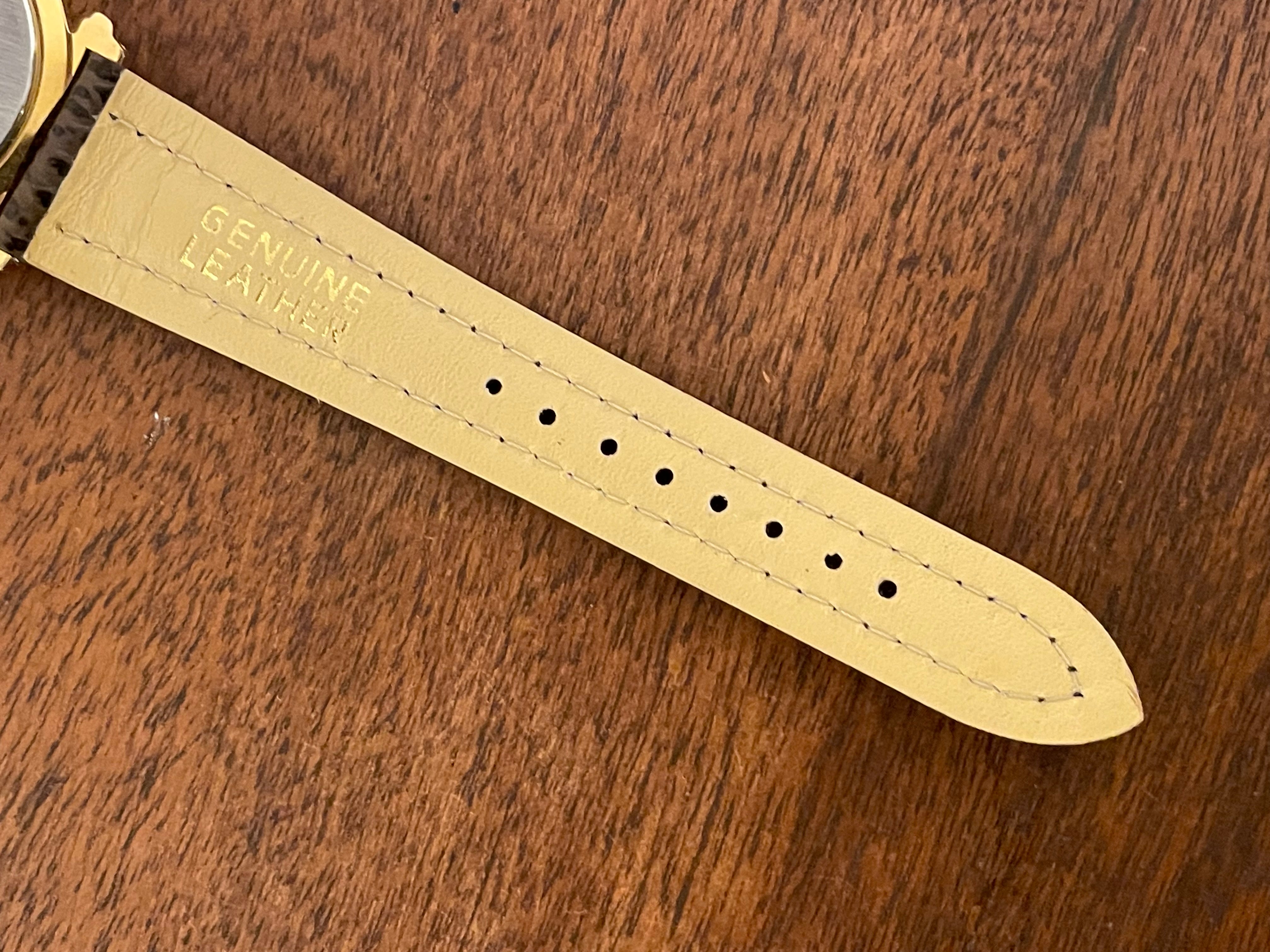 1992) Pulsar V722-7000 World Time - gold case - diamond dust dial