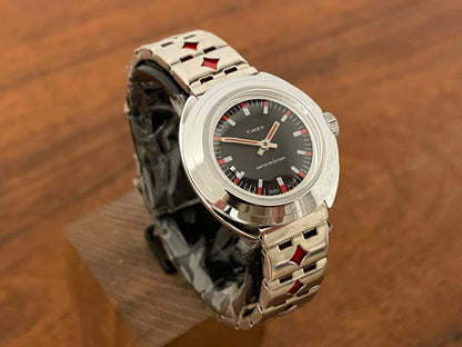 (1970s) Timex 509-528 dress watch - silver case - black dial w/ silver & red markers - small size (NOS + full set)