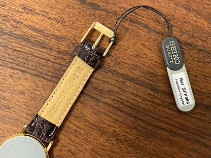 (2004) Seiko 7N00-6A70 dress watch -gold dial w/ gold markers - small size (NOS)