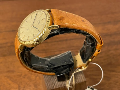 (1977) Seiko 43-0150 14K solid gold dress watch - rope bezel -  gold textured dial w/ gold markers