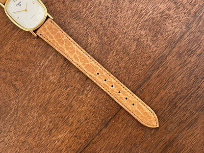 (1985) Pulsar V320-5029 "Ellipse" dress watch - gold case - diamond dust dial (NOS)