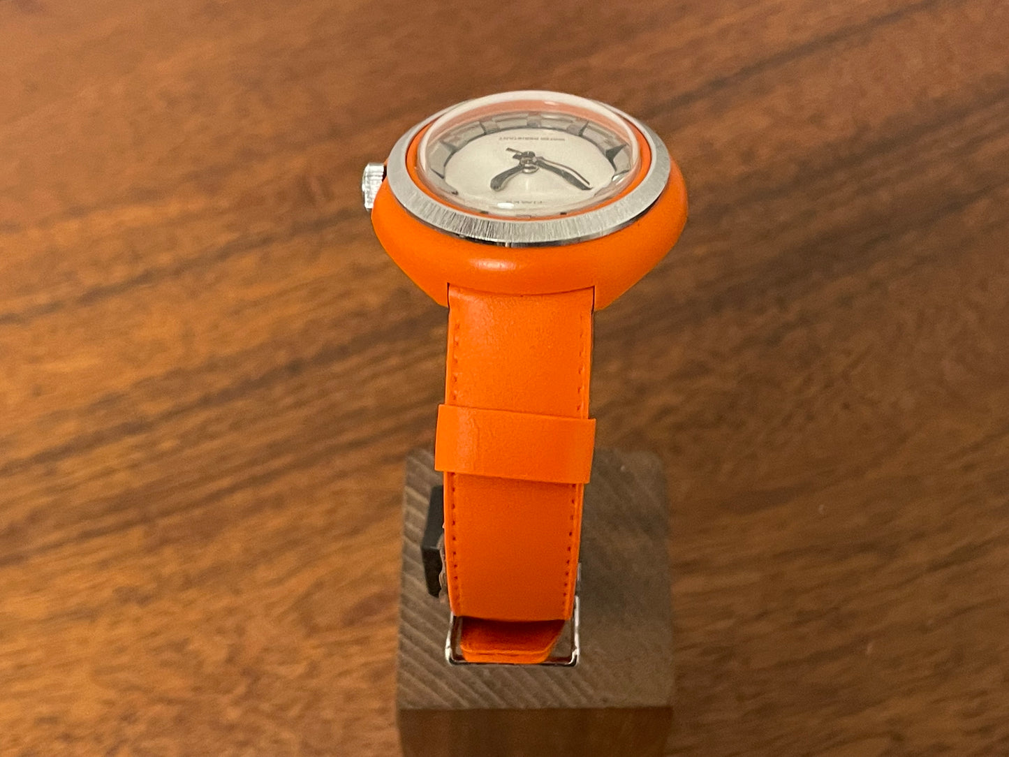 (1970s) Timex 290-181 UFO - orange plastic case - white dial w/ silver markers - small size (NOS + full set)