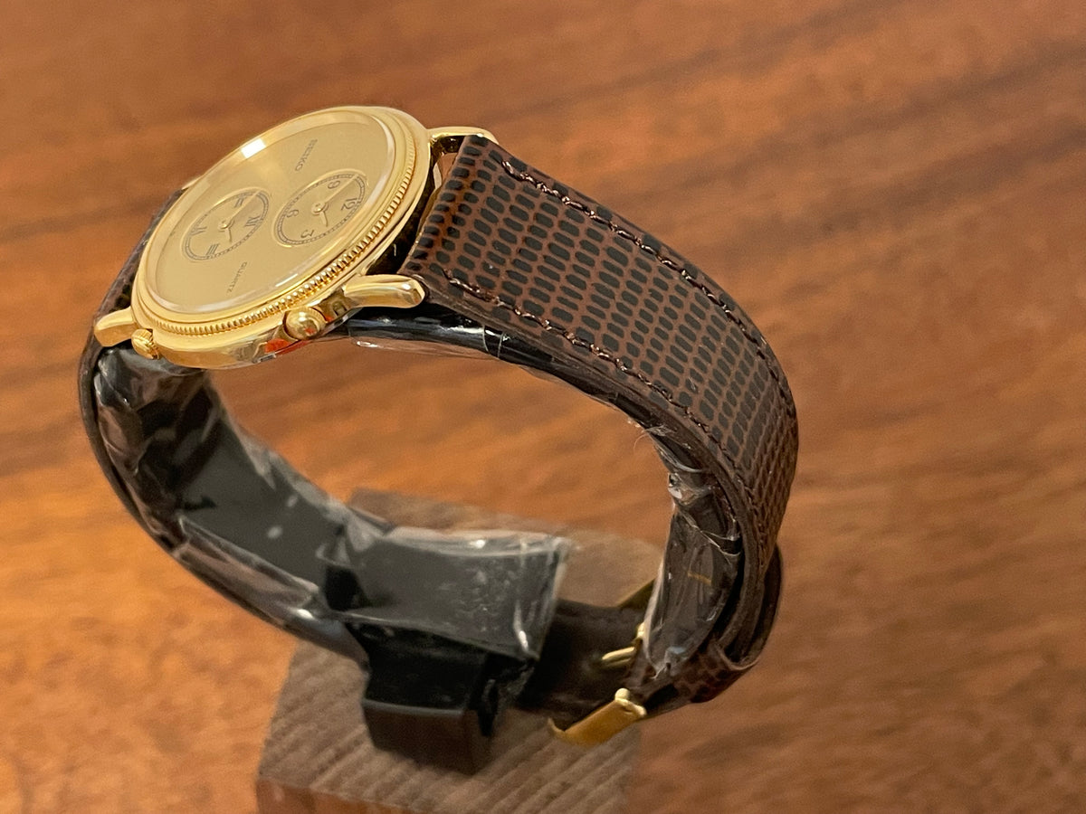 (1985) Seiko 1E20-0160 dual time dress watch - round case - gold textured dial w/ 2 subdials