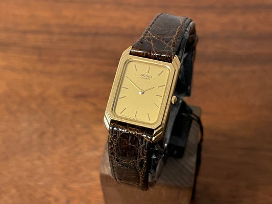 (1993) Seiko 7320-5500 "tank" dress watch - gold dial w/ gold markers - small size (NOS)