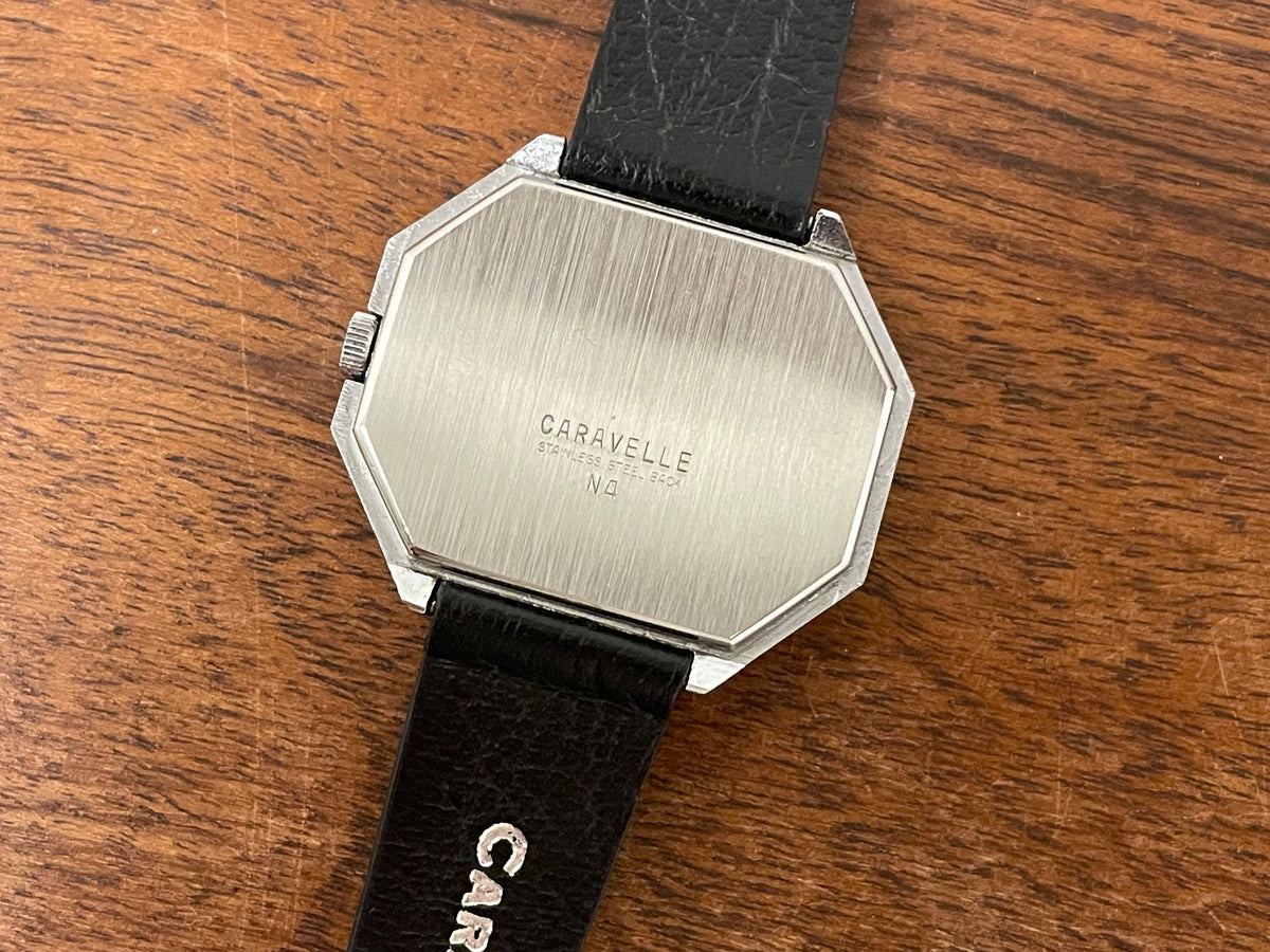 (1974) Caravelle dress watch - octagon case - brushed silver dial w/ stick markers (mint)